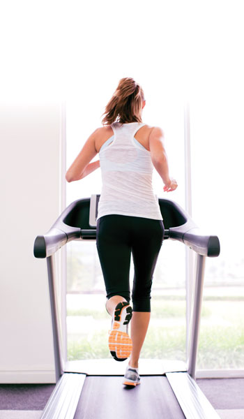 Woman running on treadmill