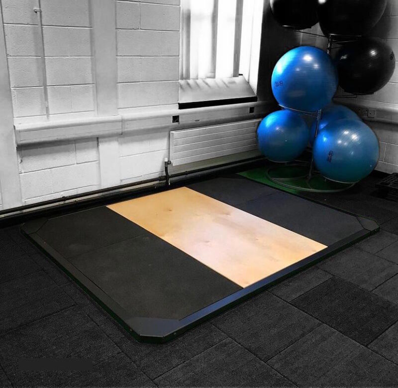 Weight Lifting Platform in a simple studio setting 